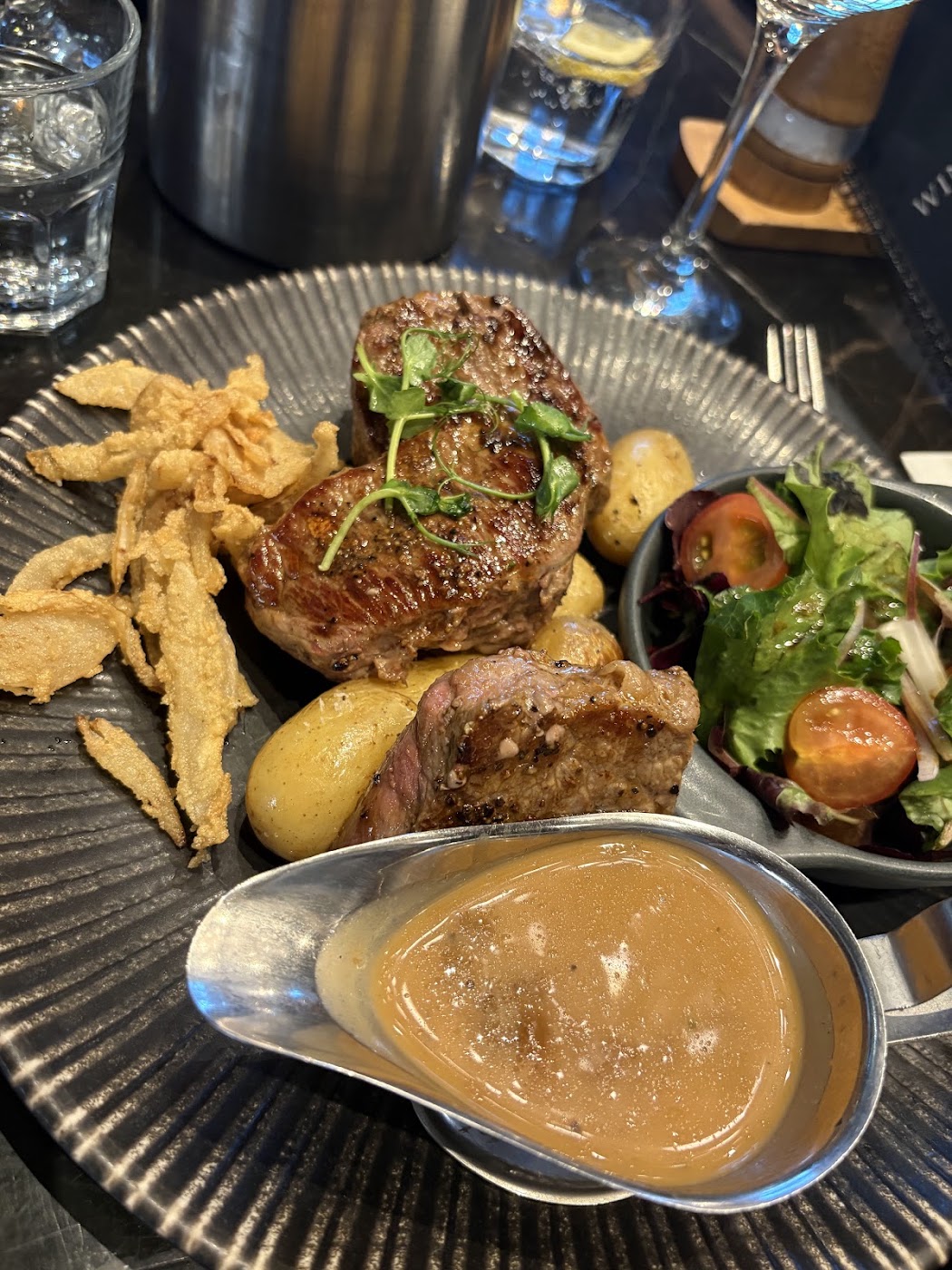 steak with potatoes and salad